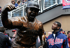 Kirby Jr. at the Kirby Puckett Statue at Target Field